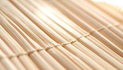 Close-up of woven bamboo, light-colored and tightly bound, angled composition