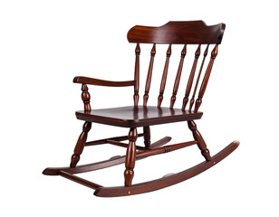 A wooden rocking chair, varnished brown, sits isolated against a black background