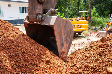 Excavation operations for construction site preparation rural area machinery outdoor ground level heavy equipment usage