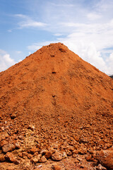 Construction activity residential area soil pile outdoor setting ground-level view earthworks concept