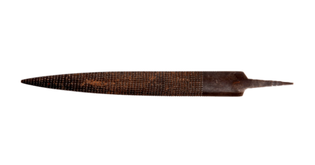Close up of a vintage rusty metal rasp tool, essential for craftsmanship.