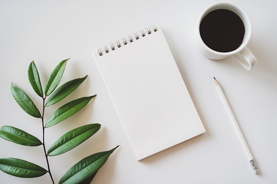 Neat workplace with notebook and coffee 