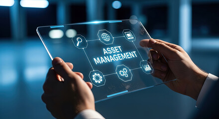 Innovative Asset Management Concept: Businessman Holding Transparent Tablet Displaying Financial Data and Investment Strategies for Growth and Success