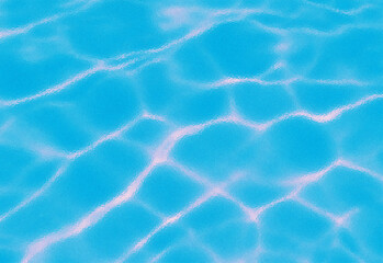 Abstract blue water surface with bright light reflections and ripples, creating a mesmerizing and dynamic aquatic texture perfect for summer relaxation themes