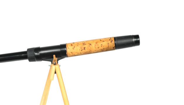 Close up of a fishing rod with a cork handle on a tripod isolated on a white background.