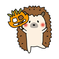 落ち葉のお面を持つハリネズミ