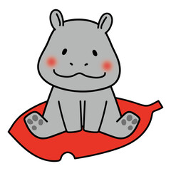 大きな落ち葉に乗るカバ