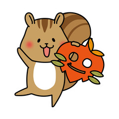 落ち葉のお面を持つリス