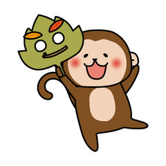 落ち葉のお面を持つ猿