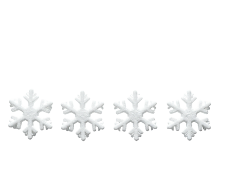 Four white symmetrical winter crystals arranged horizontally on a black background