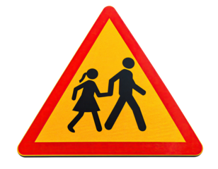 Yellow triangle road sign with a child and adult holding hands, walking