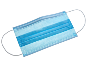 Overhead shot of a blue and white surgical mask with ear loops, isolated