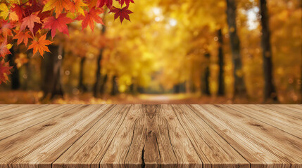empty wooden table with autumn leaves against blurred fall forest background