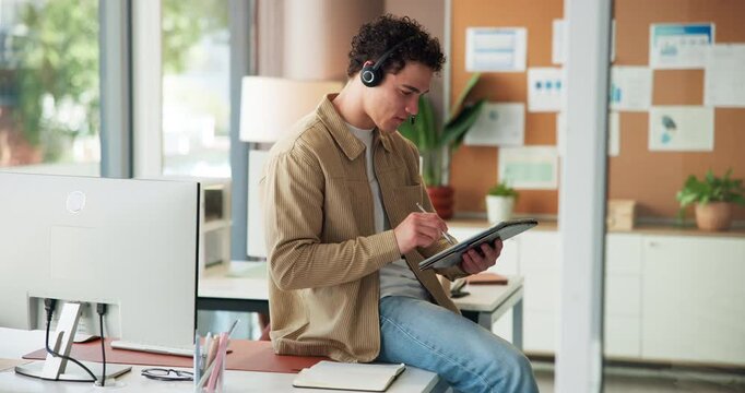 Creative, man and headphones with tablet in office for editing sketch, web design and graphic designer. Male person, stylus and digital art for campaign layout, research and brand logo for project