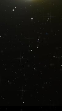 Vertical background video with sparkling light particles