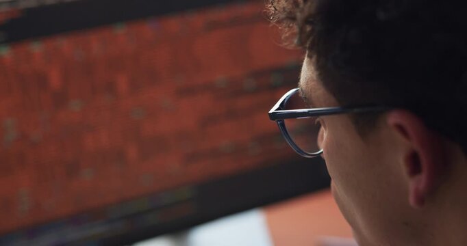 Man, reading and code with HTML on computer screen for software development, web design or hyperlinks at office. Programmer, review or app developer with frontend UI or UX for website cybersecurity