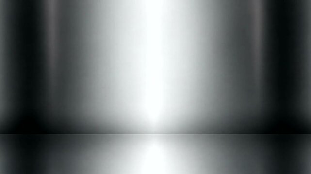 Shiny metallic surface with soft reflections, ideal for product photography background
