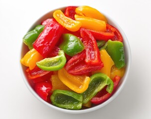 Colorful sliced bell peppers in a white bowl