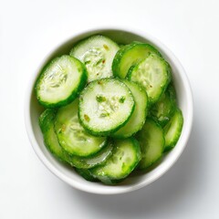 Sliced cucumbers in a small white bowl (1)