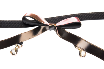 Elegant black choker necklace with shiny rose gold bow and dangling crystal charms
