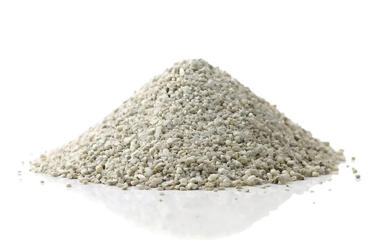 A conical pile of fine light gray granular material on a white surface against a black background