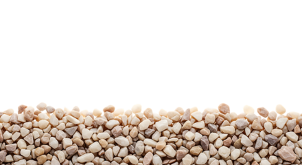 Natural small beige and brown pebbles forming a textured border against a stark black background