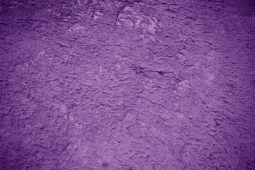 textured background of plaster purple color