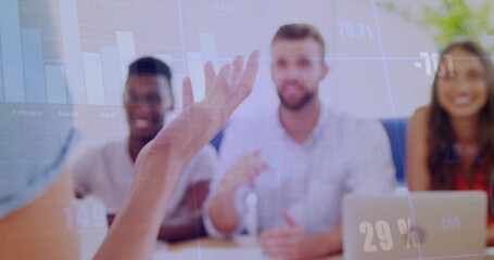 Discussing three professionals collaborating in conference room, with laptop and data overlay