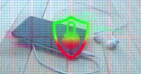 Showing shield with padlock fingerprint over desk with phone, earbuds, cable and code grid overlay