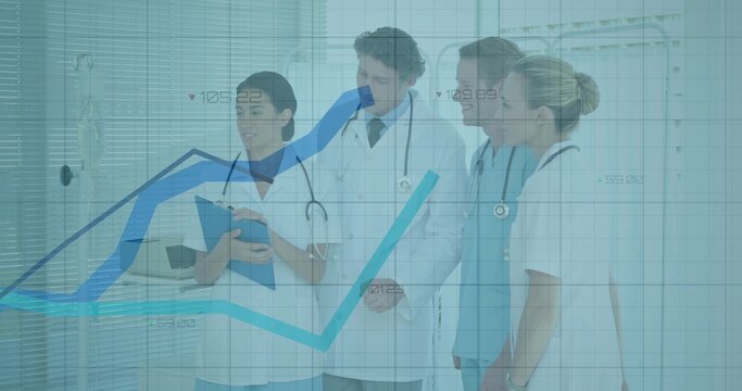 Hospital staff in scrubs, coats conferencing in corridor with clipboard stethoscopes, graph overlay