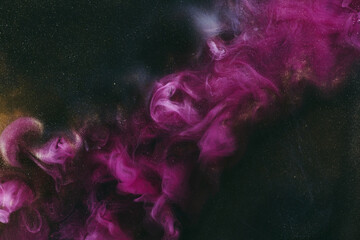 Abstract fluid art background. Moving flow of purple gold paints, dark space sky