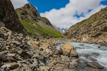 Panorama of a turquoise river flowing between the mountains