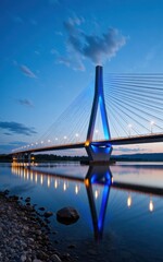Obraz premium Illuminated suspension bridge at dusk urban landscape photography serene water reflections aesthetic perspective