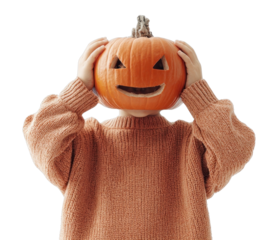 PNG Child holding a carved pumpkin halloween sweater costume.