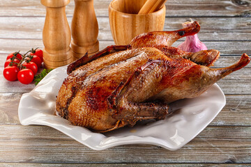 Baked with spices whole duck