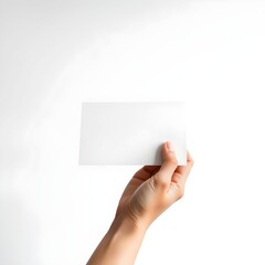 hand holding blank business card