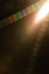 Abstract sun flare. The lens flare is subject to digital correction