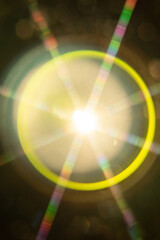 Abstract sun flare. The lens flare is subject to digital correction