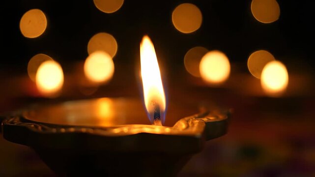 Serene traditional clay oil lamp lit for Diwali celebration.