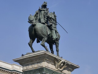 Fototapeta premium Vittorio Emanuele II bronze statue behind in Dome square Milan, Lombardy, Italy