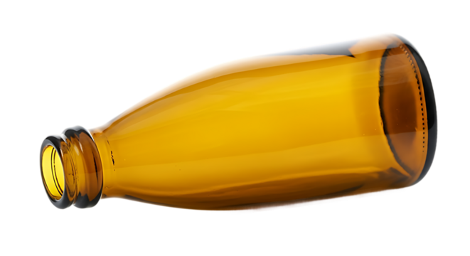 Antique amber glass bottle lying down isolated on a black background with a simple design