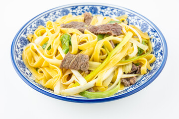 A plate of beef fried corn noodles