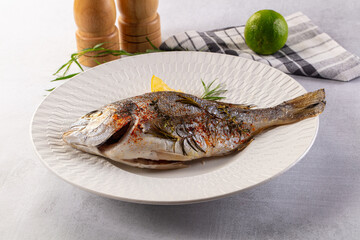 Baked dorada fish with spices