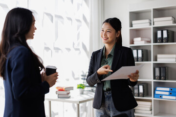 Fototapeta premium Business financing accounting banking concept. Two Business doing finances and calculate on desk about cost at home office. Businessworking on desk with using calculator, finance accounting.