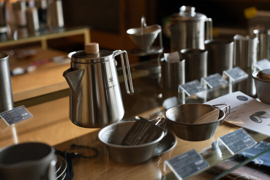 KYOTO, JAPAN - FEB 14, 2025: Close up of Snow Peak stainless steel coffee gear.