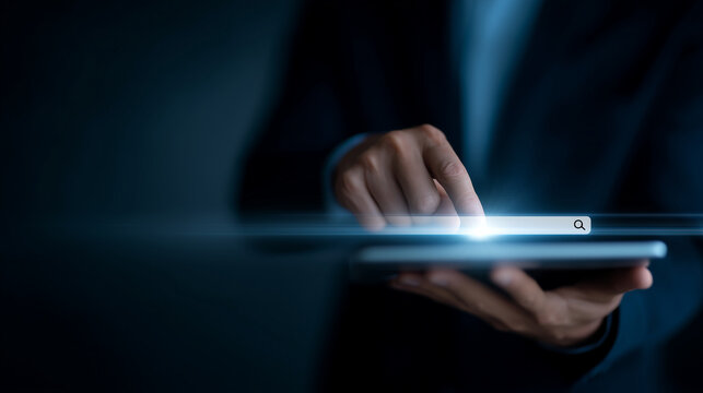 digital search concept, businessman using stylus on tablet with virtual search bar interface, modern technology and internet browsing concept, futuristic workspace lighting search