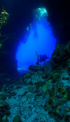 Cathedrals of light - Underwater photo of rays of sunlight inside caves. and tunnels From scuba cave diving in the south of Egypt. St:Johns reef.