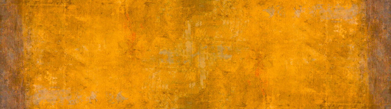 Abstract old aged yellow scratched grunge metal or stone concrete wall texture with rust, background backdrop wallper template pattern long panorama wide