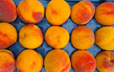 Fresh fruits and vegetables. Photos of ripe peaches.