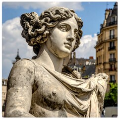 Statue of woman in Paris, in front of old architecture